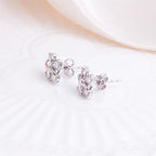 Elegant Moissanite Cross Stud Earrings