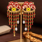 Regal Eye Tassel Drop Earrings