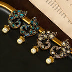Ornate Peacock Pearl Drop Earrings