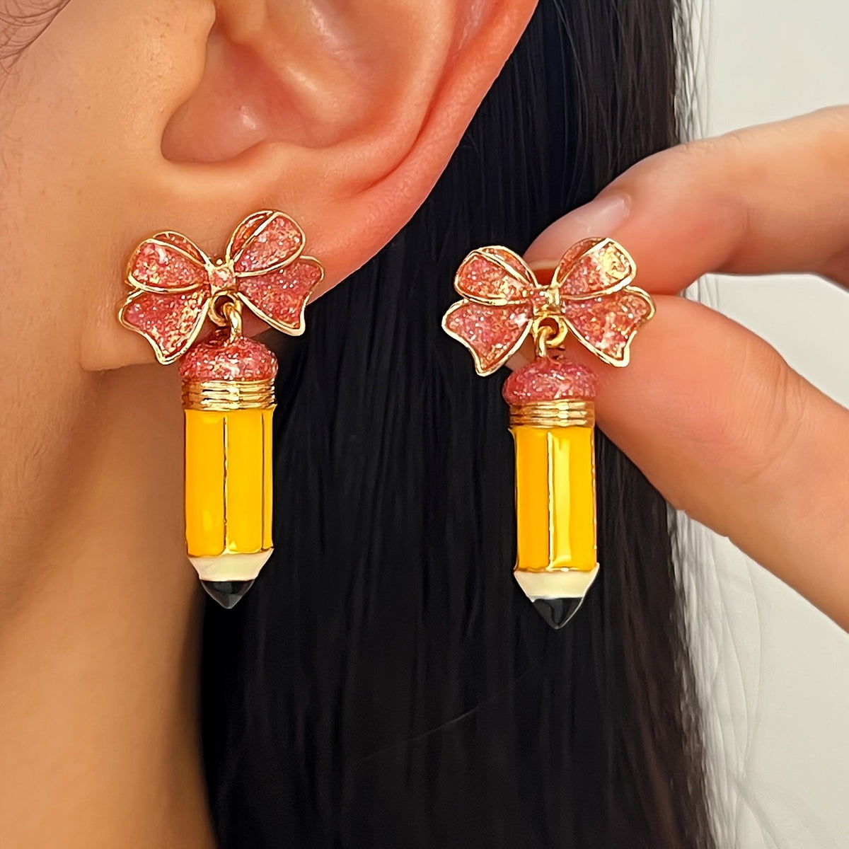 Whimsical Glitter Bow Pencil Drop Earrings
