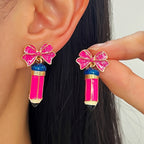 Whimsical Glitter Bow Pencil Drop Earrings