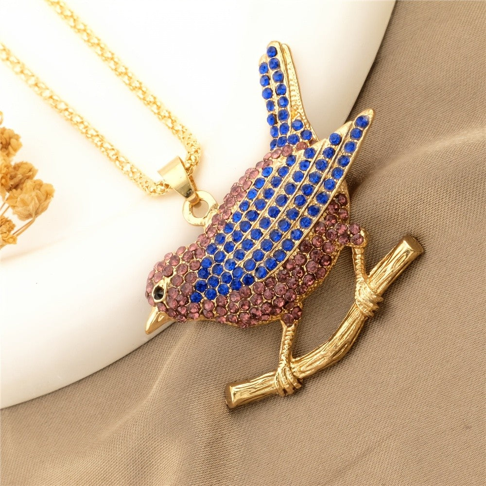Whimsical Bird Branch Glass Necklace