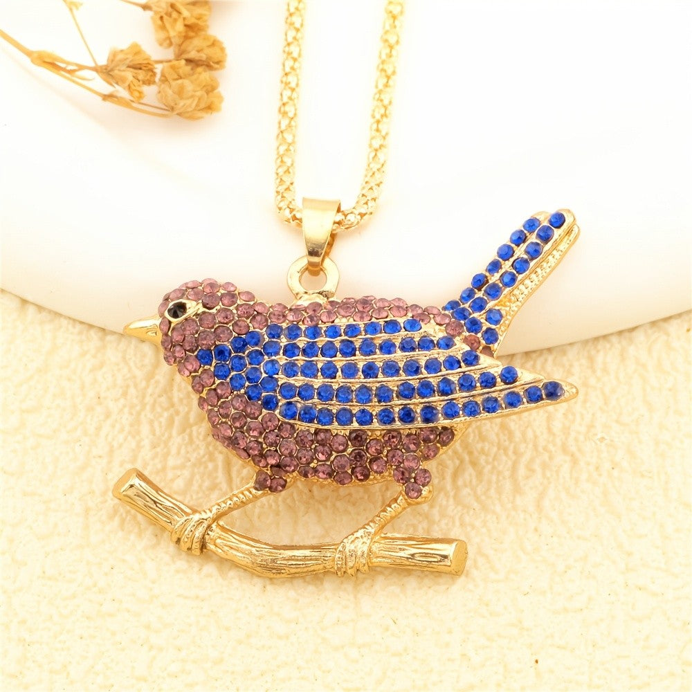 Whimsical Bird Branch Glass Necklace