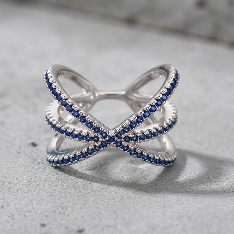 Elegant Blue Pave X Ring